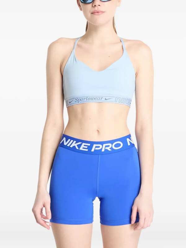 Nike brassière de sport à design matelassé - Bleu