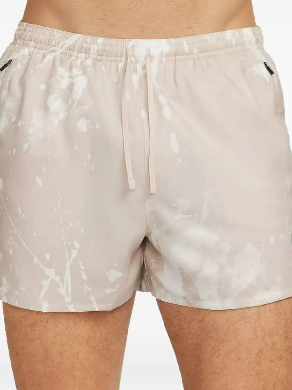 Nike short de sport Dri-Fit Stride Run - Tons neutres